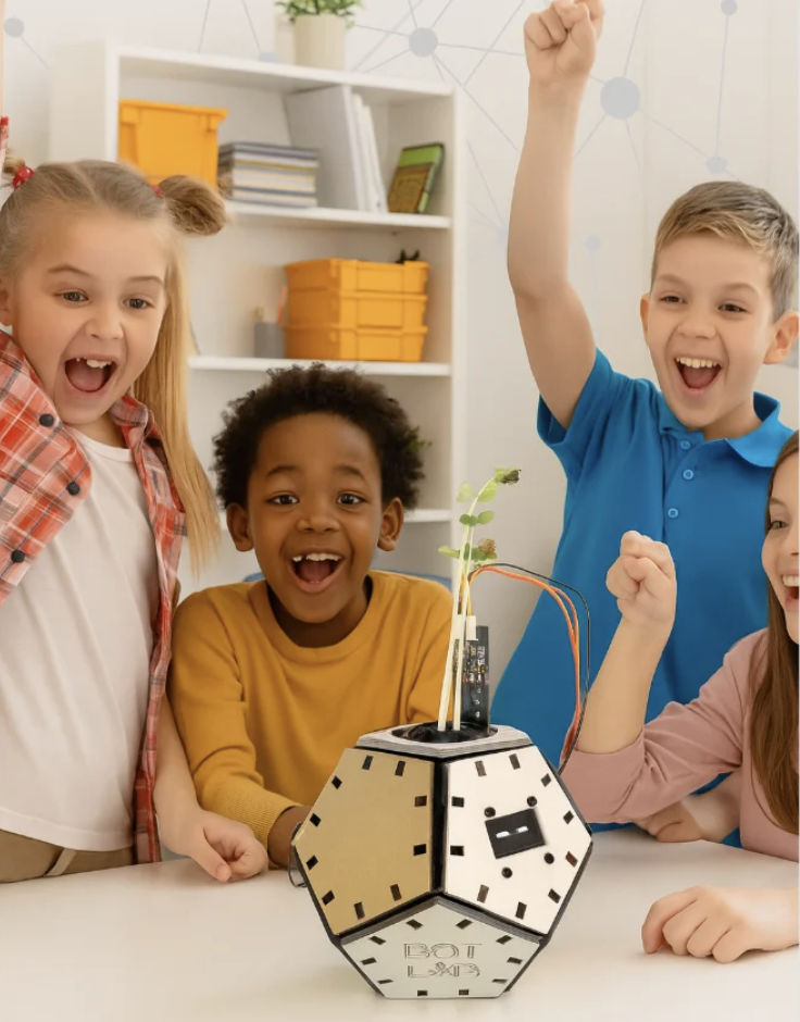 Niños usando tecnología educativa BotLab